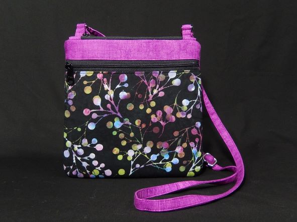 Black Handbag with Purple Trim and Purple Shoulder Strap with Flowers